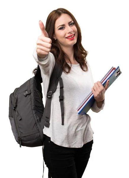 Diák nő a hüvelykujjával felfelé — Stock Fotó
