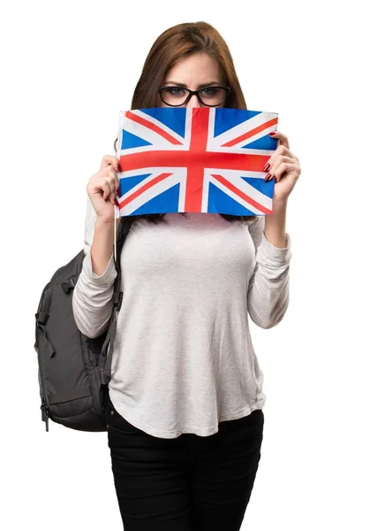 イギリスの旗を保持している学生女性 — ストック写真