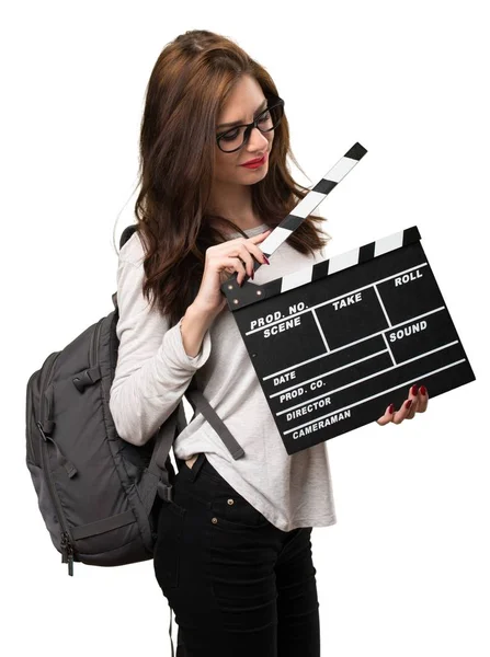 Student woman holding a clapperboard — Stock Photo, Image