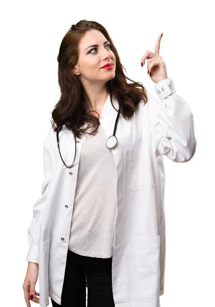 Mujer doctora señalando hacia arriba — Foto de Stock