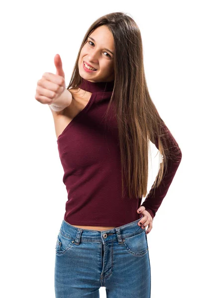 Junges Teenager-Mädchen mit erhobenem Daumen — Stockfoto