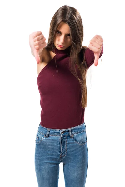 Mädchen macht schlechtes Signal — Stockfoto