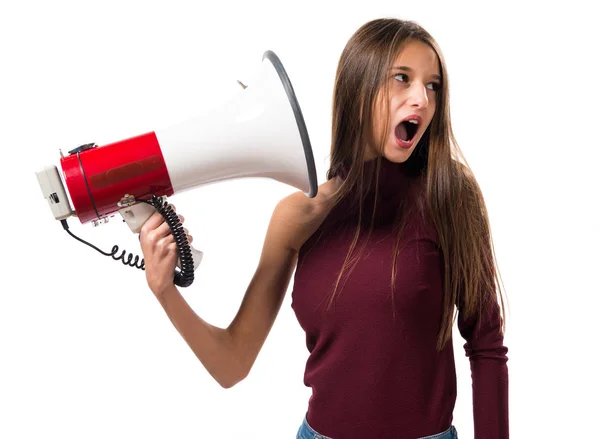Młody nastolatek dziewczyna krzyczał przez megafon — Zdjęcie stockowe