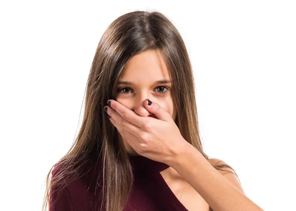 Young teenager girl covering her mouth — Stock Photo, Image