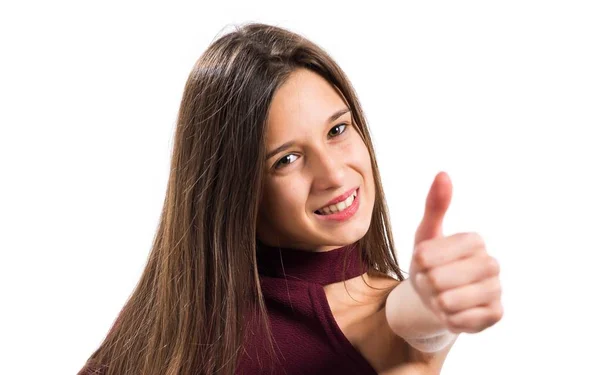 Joven adolescente con el pulgar hacia arriba — Foto de Stock