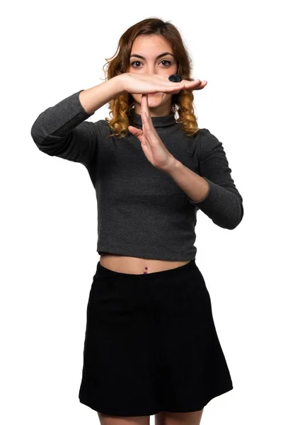 Beautiful young girl making time out gesture — Stock Photo, Image