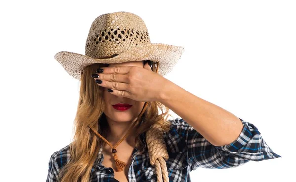 Sexy blonde woman cowgirl covering her eyes — Stock Photo, Image