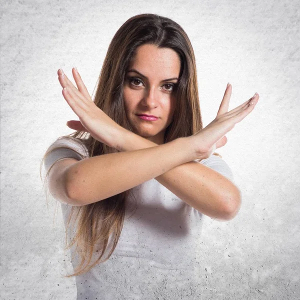 Young pretty girl making NO gesture — Stock Photo, Image