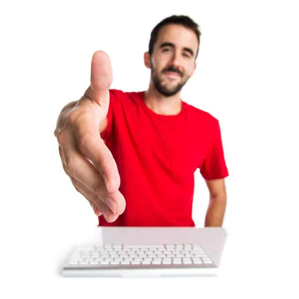 Técnico informático trabajando con su teclado haciendo un trato — Foto de Stock