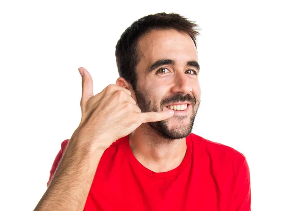 Brunette man making phone gesture — Stock Photo, Image