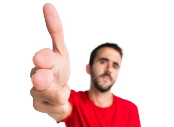 Brunette man making gun gesture — Stock Photo, Image