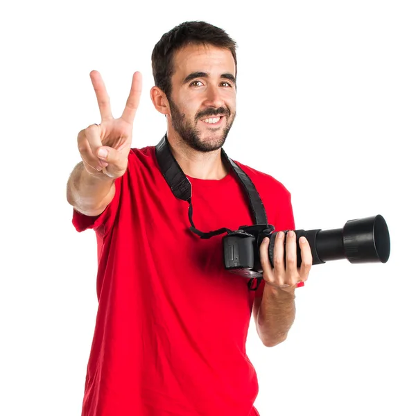 Fotografo che fa un gesto di vittoria — Foto Stock