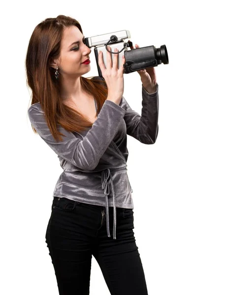 Beautiful young girl filming — Stock Photo, Image