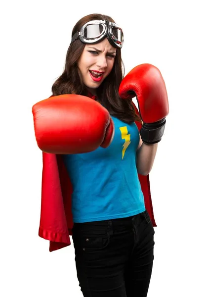 Menina super-herói bonita com luvas de boxe — Fotografia de Stock