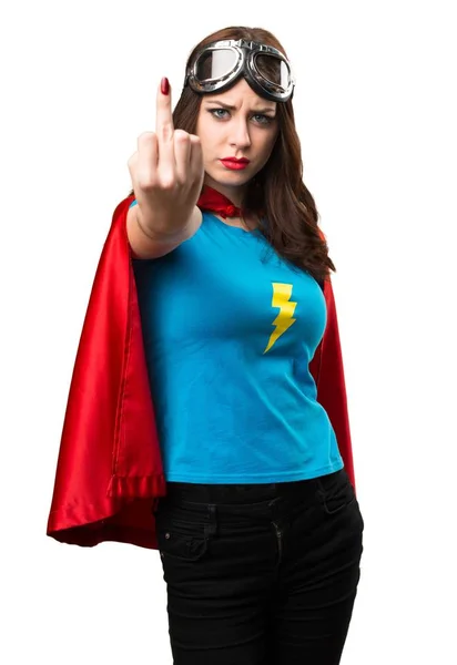 Mooie superheld meisje hoorn gebaar maken — Stockfoto