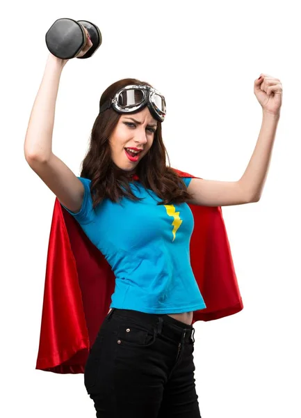 Menina super-herói fazendo levantamento de peso — Fotografia de Stock