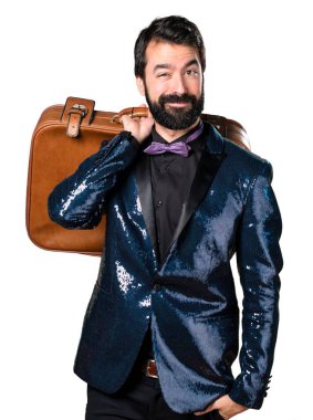 Yakışıklı bir vintage çanta tutan payet ceket ile