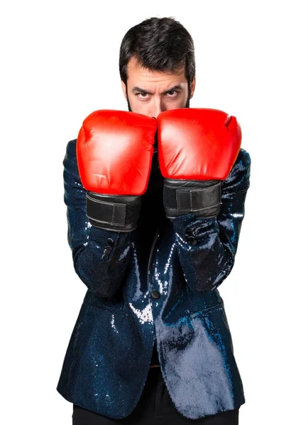 Handsome man with sequin jacket with boxing gloves — Stock Photo, Image