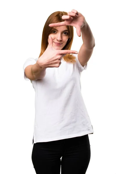 Beautiful young girl focusing with her fingers — Stock Photo, Image