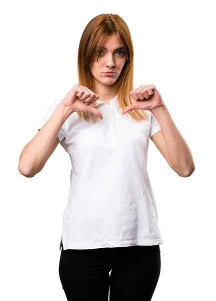 Schönes junges Mädchen macht schlechtes Signal — Stockfoto