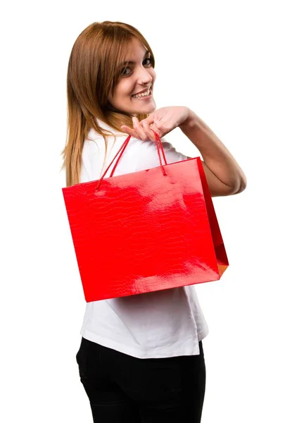 Menina bonita feliz com saco de compras — Fotografia de Stock