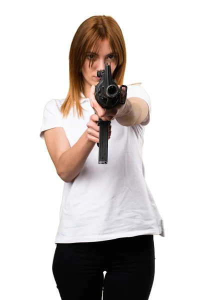 Vacker ung flicka håller ett gevär — Stockfoto