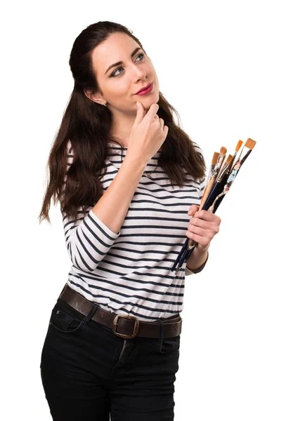 Vrouw van de jonge kunstenaar denken — Stockfoto