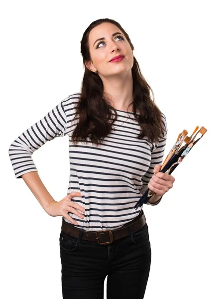 Young artist woman looking up — Stock Photo, Image