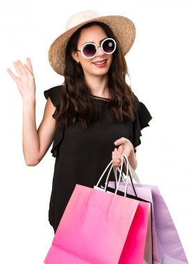 Alışveriş çantası selamlayan ile güzel genç kız