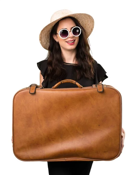 Όμορφη νεαρή κοπέλα με μια βαλίτσα — Φωτογραφία Αρχείου