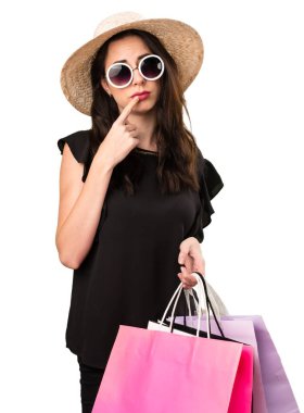 Güzel genç kız alışveriş çantası düşünce ile