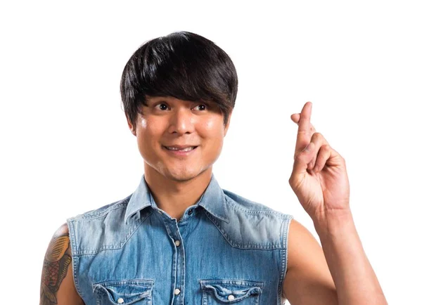 Asiático bonito homem com seus dedos cruzando — Fotografia de Stock