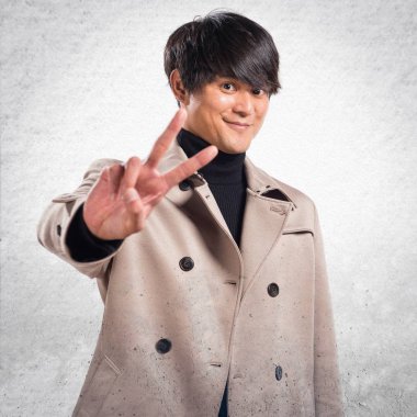 Zafer jest yapma Asya yakışıklı dokulu arka plan