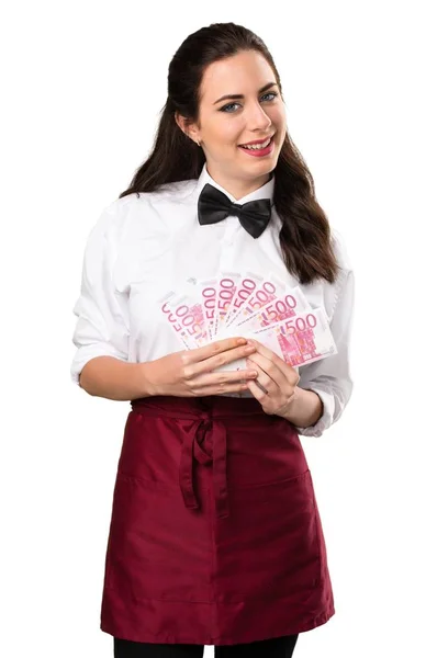 Young beautiful waitress taking a lot of money — Stock Photo, Image