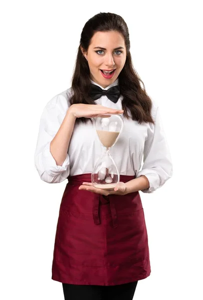 Young beautiful waitress  holding vintage clock — Stock Photo, Image