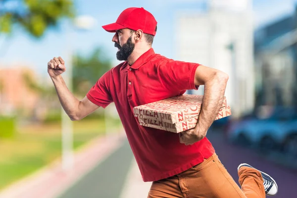 Entrega de pizza homem correndo rápido — Fotografia de Stock
