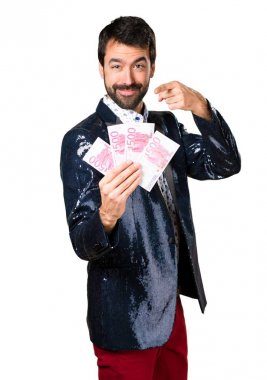 Adam bir sürü para alarak ceket ile