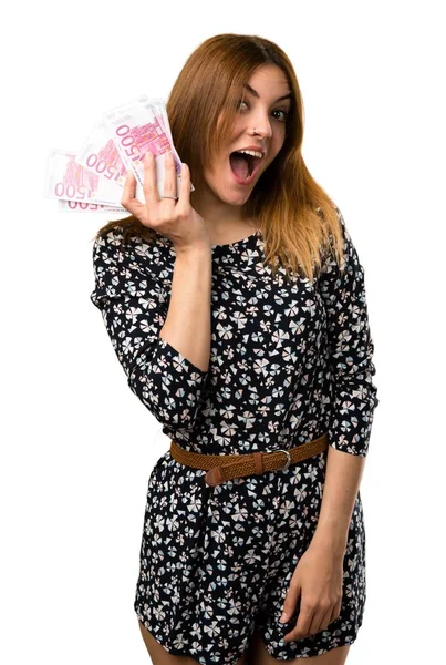 Menina bonita tomando um monte de dinheiro — Fotografia de Stock