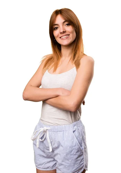 Beautiful girl in pajamas with her arms crossed — Stock Photo, Image