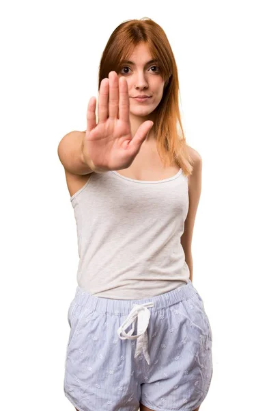 Hermosa chica en pijama haciendo stop sign — Foto de Stock