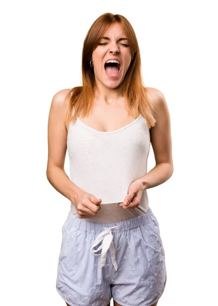 Beautiful girl in pajamas shouting — Stock Photo, Image