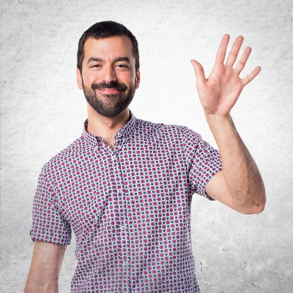 Hombre guapo sobre fondo blanco aislado — Foto de Stock