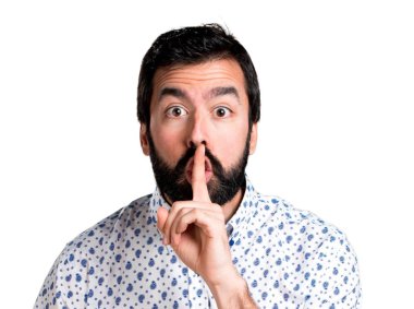 Sessizlik jest yapma sakallı yakışıklı esmer adam