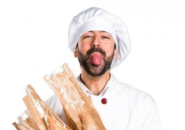 Biraz ekmek tutarak ve onun dilini alarak genç baker