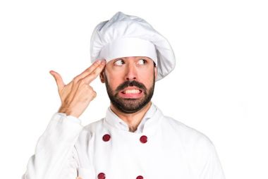 Biraz ekmek tutarak ve intihar jest yapma genç baker