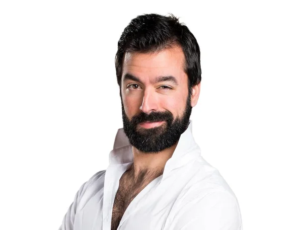 Hombre guapo con barba con los brazos cruzados — Foto de Stock