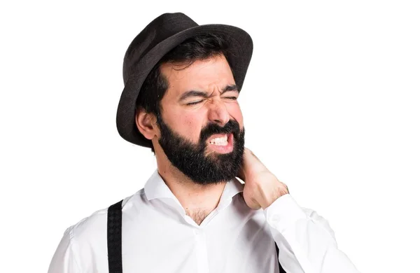 Хипстер с бородой и болью в шее — стоковое фото