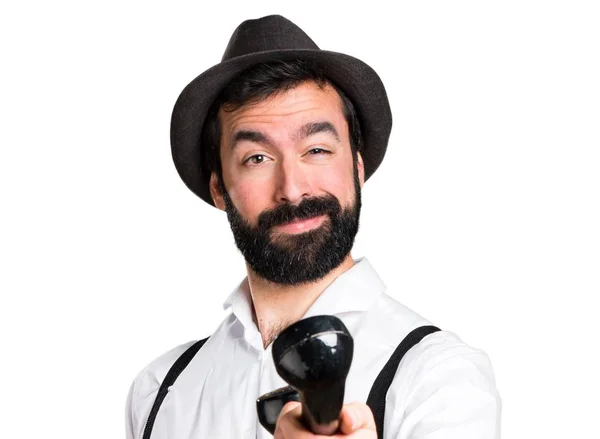 Hipster man with beard talking to vintage phone — Stock Photo, Image