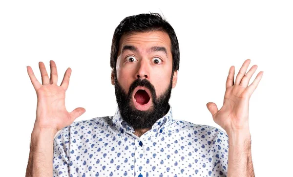 Sürpriz bir jest yapma sakallı yakışıklı esmer adam