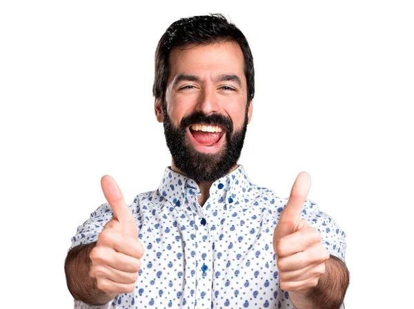 Bonito morena homem com barba com polegar para cima — Fotografia de Stock